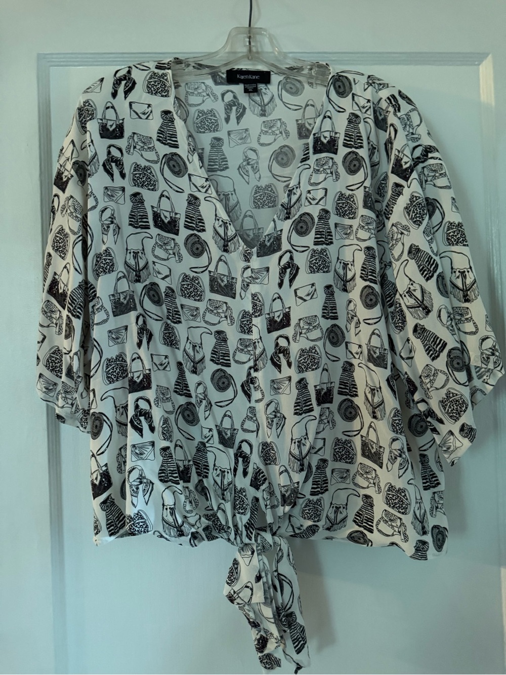 Karen Kane White & Black Scarf and Purse PrintTie-Hem V-Neck Blouse